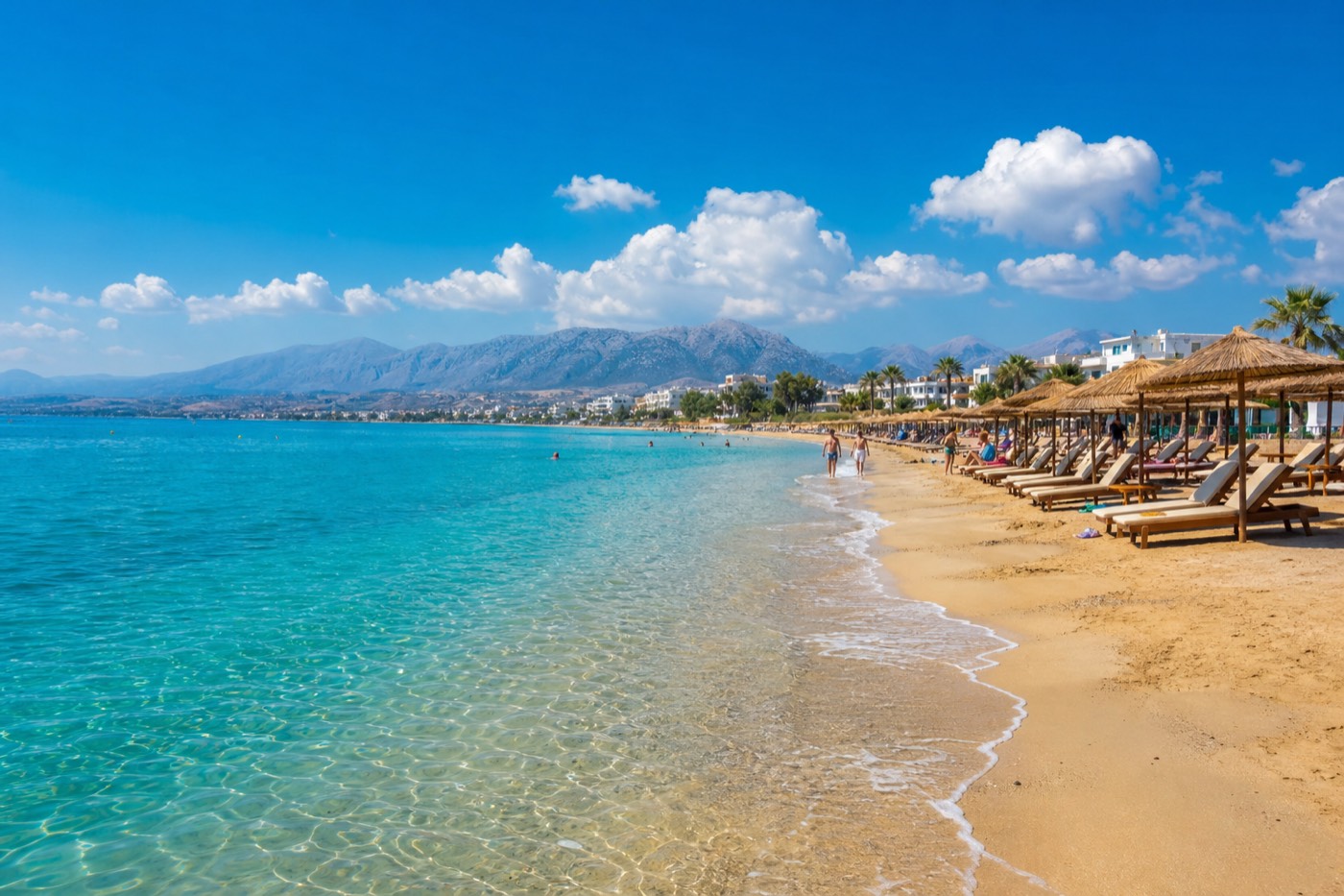 Clear turquoise water at a sandy beach near Heraklion, Crete